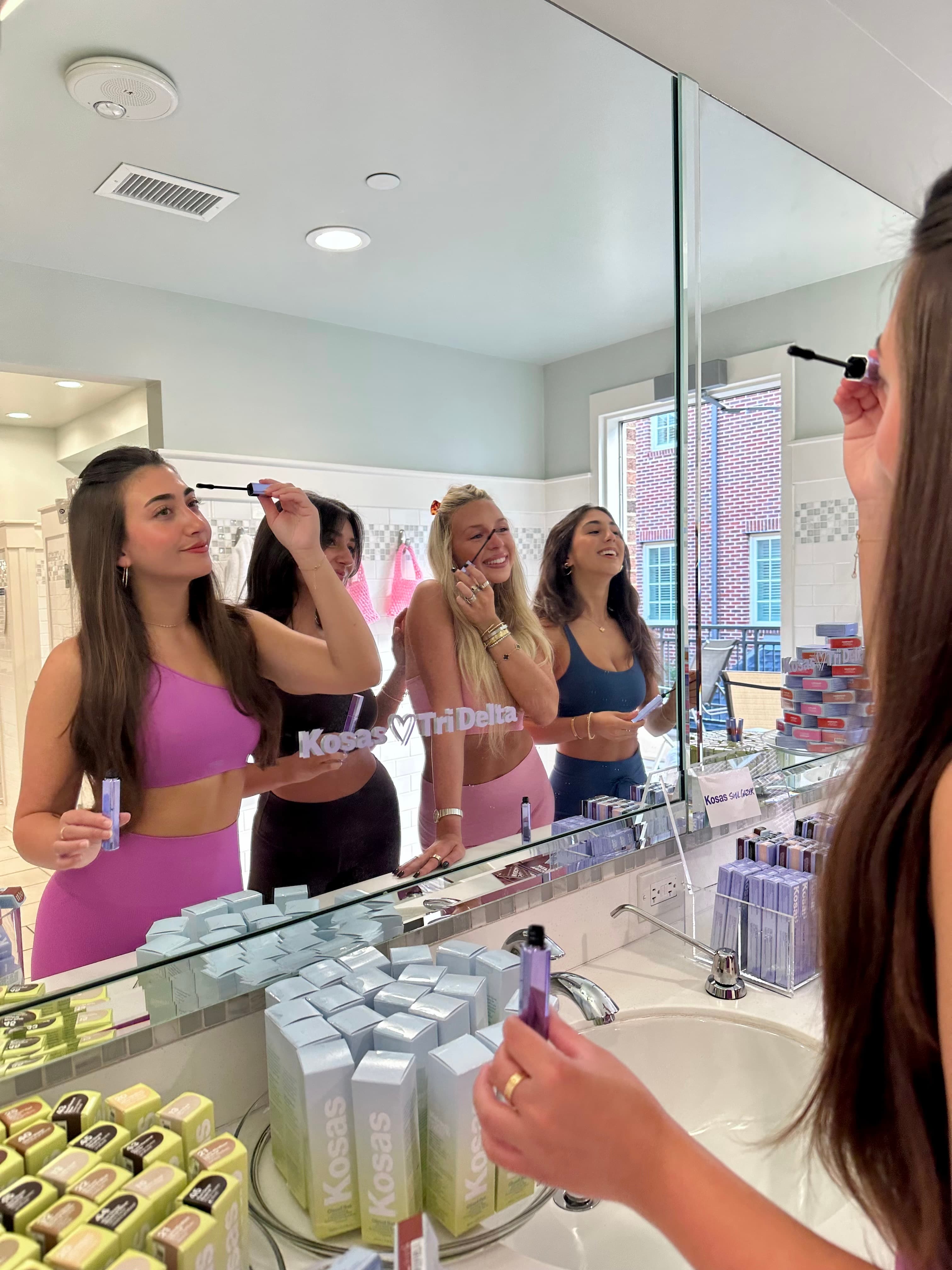 Students using the new Kosas Soulglazer mascara